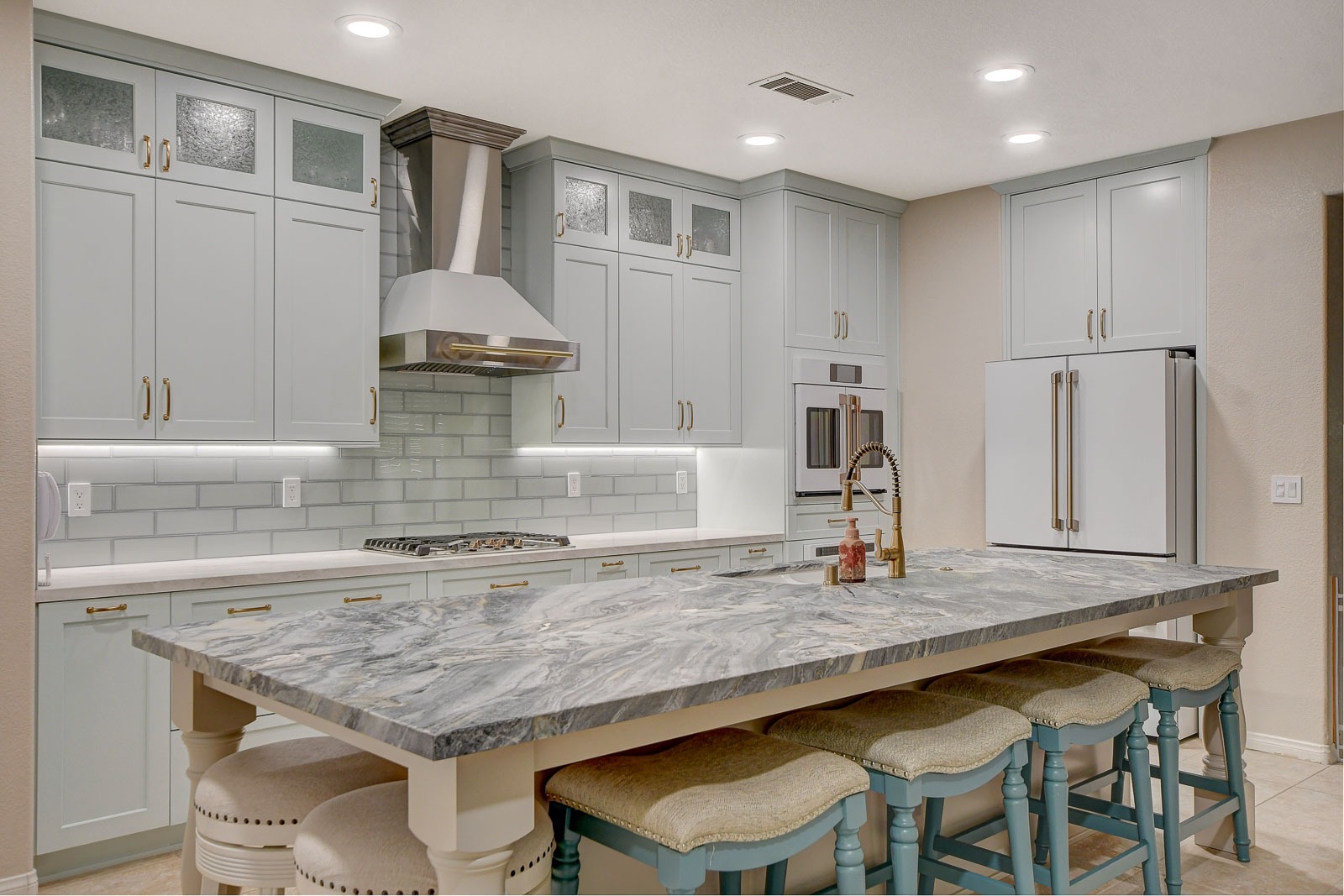 Kitchen with island counter and door to the outside